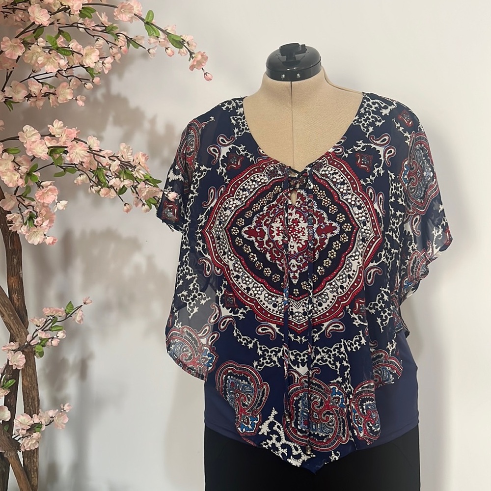 Women’s poncho style blouse.